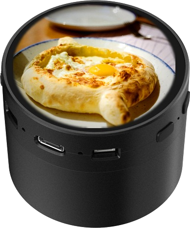 WaiterVoice speaker concept with a photo of the dish on its round screen